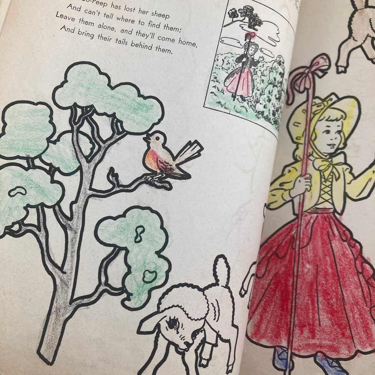 Another colorful illustration from Children's Activities for Home and School, May 1951, depicting a scene with a girl holding a staff and interacting with sheep and trees.