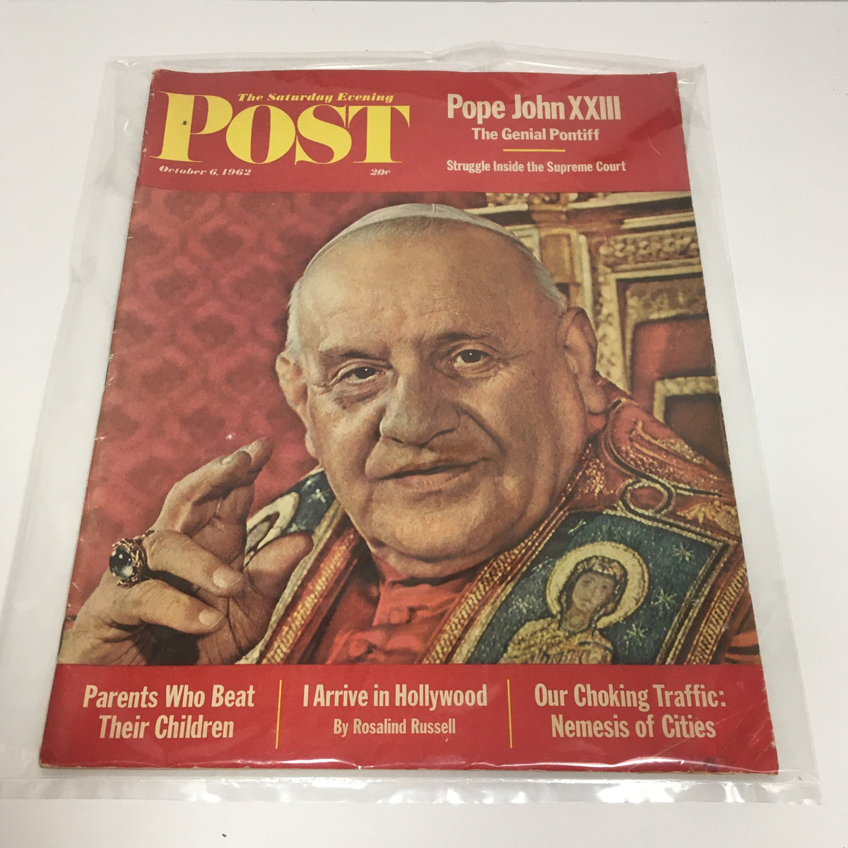 Cover of The Saturday Evening Post from October 6, 1962, featuring Pope John XXIII, known as The Genial Pontiff, in a vibrant portrait with a red background and gold attire.