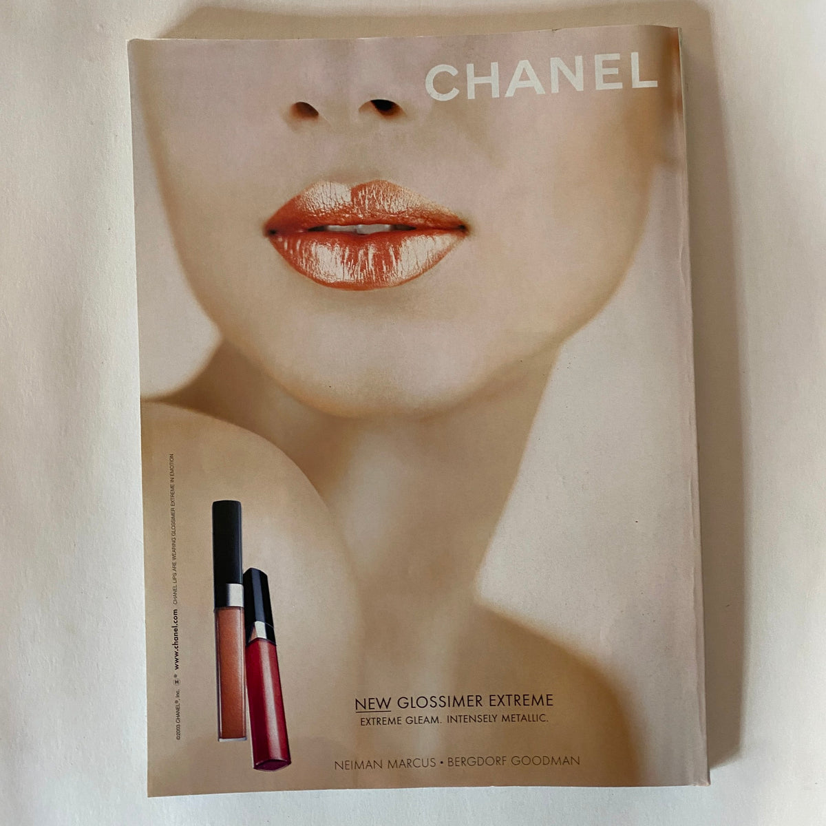 Vogue Magazine June 2003 Reese Witherspoon Cover No Label VG showcasing a beauty advertisement for Chanel featuring a close-up of lips with a glossy finish, highlighting new glossimer products.