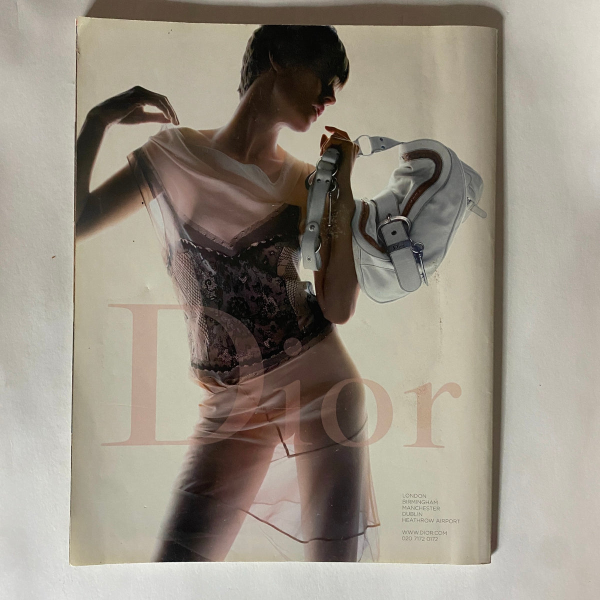 Tatler Magazine February 2006 Kate Beckinsale Cover showcasing a vintage fashion theme, featuring a soft-focus image of a model in an elegant pose, highlighting the glamour of early 2000s celebrity culture.