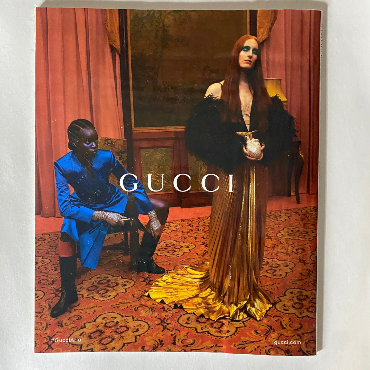 Cover of Harper's Bazaar Magazine February 2022 featuring Alana Haim, showcasing Gucci fashion with elegant styling and a stunning visual presentation.
