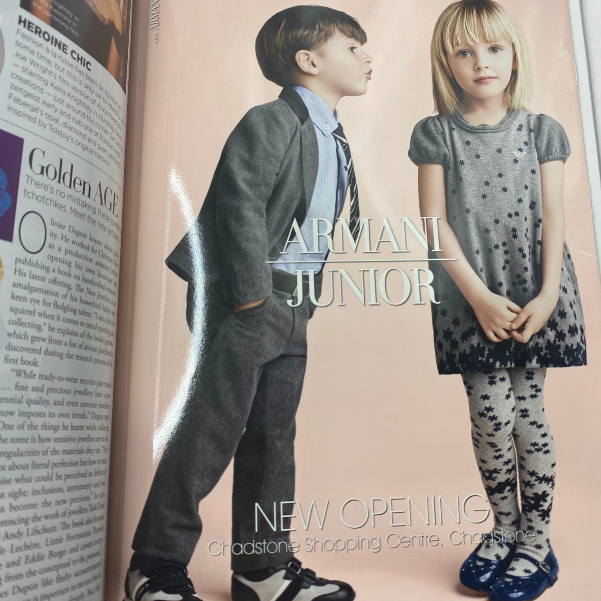 Ad for Armani Junior in Harper's Bazaar Australia Magazine November 2012, highlighting stylish children's fashion with a formal look.