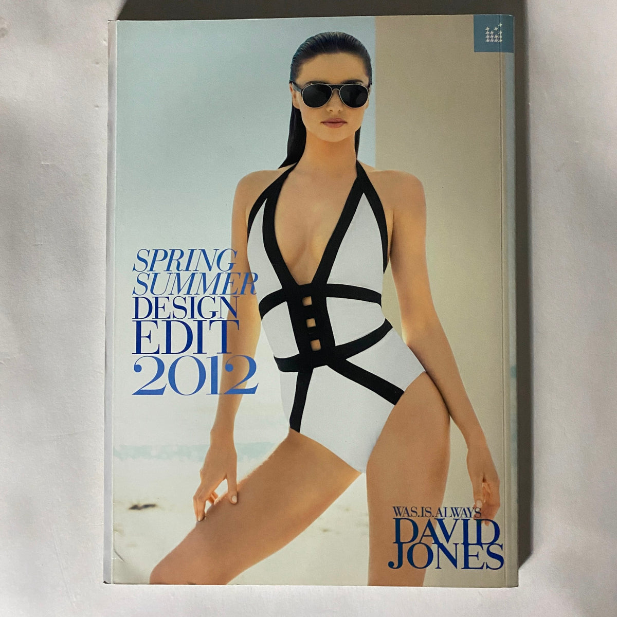 Cover of David Jones Spring Summer Design Edit 2012, exhibiting a stylish black and white swimsuit model, representing high fashion and design trends of the early 2010s.