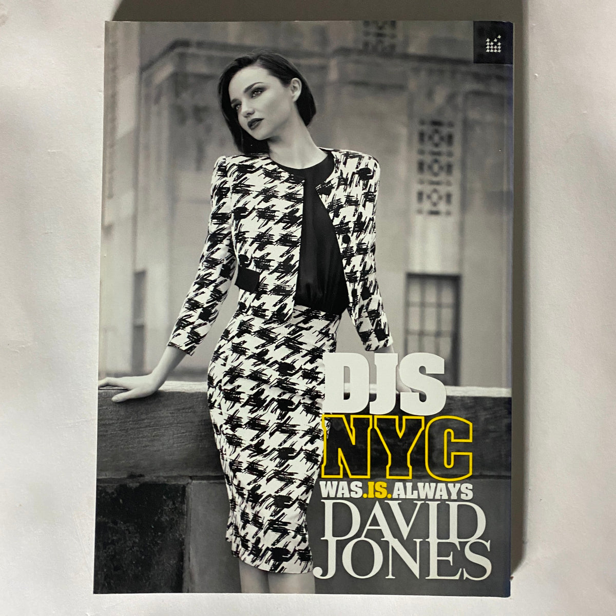 Promotional page for David Jones from Harper's Bazaar Australia Spring 2012, showcasing a stylish model in a striking black and white outfit.