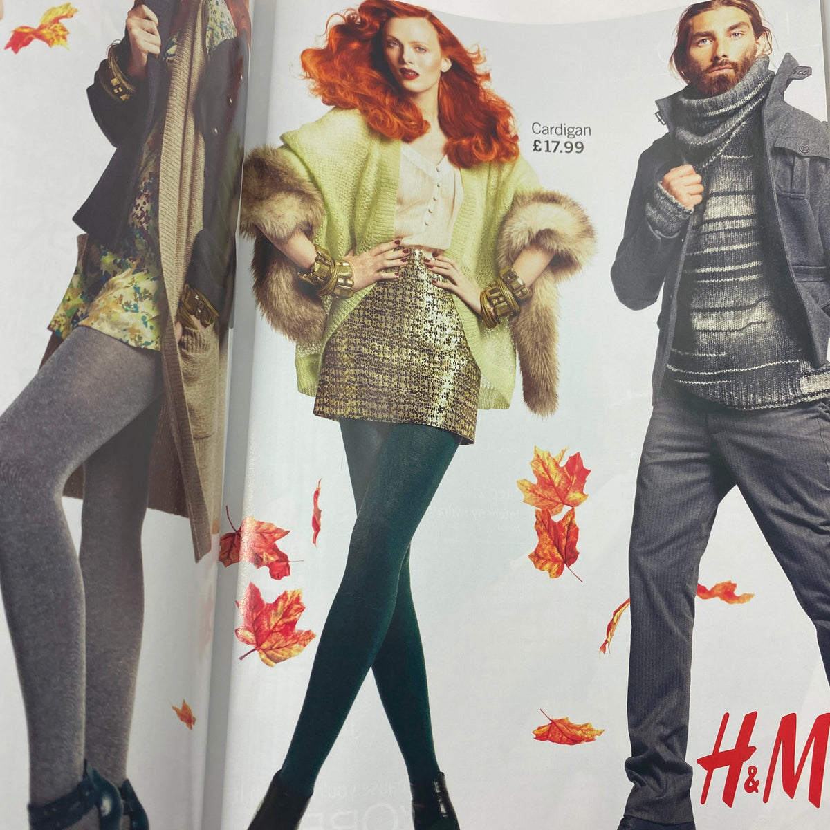 Fashion advertisement from Harper's Bazaar UK Magazine October 2009 showcasing a model in a stylish outfit with a sparkling mini skirt and oversized cardigan. The image illustrates the latest trends in fashion, featuring vibrant autumn leaves.