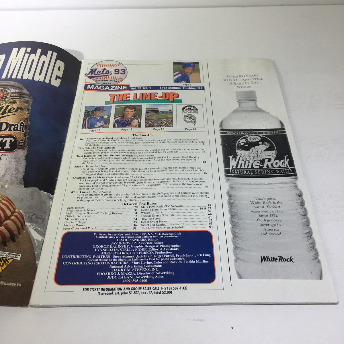 Inside page of the 1993 Mets Vs. Rockies Scorebook showing team line-ups and advertisements.