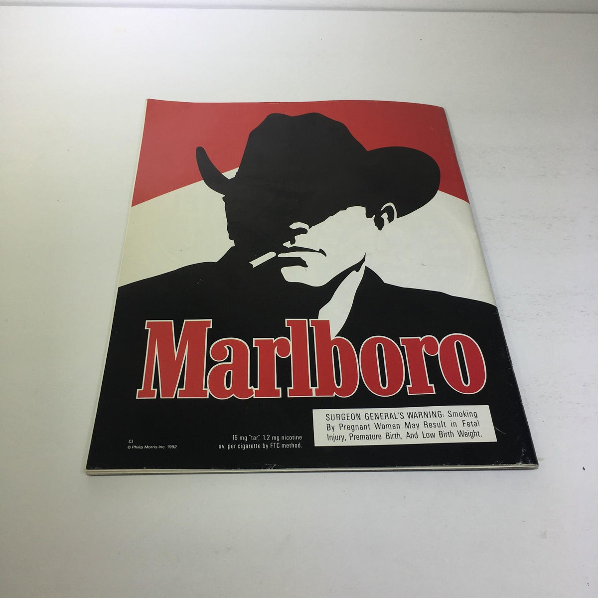 1993 Mets Vs. Rockies April 5 & 7, Shea Stadium, Scorebook cover featuring a vintage Marlboro advertisement with a silhouette of a man in a cowboy hat and a cigarette.