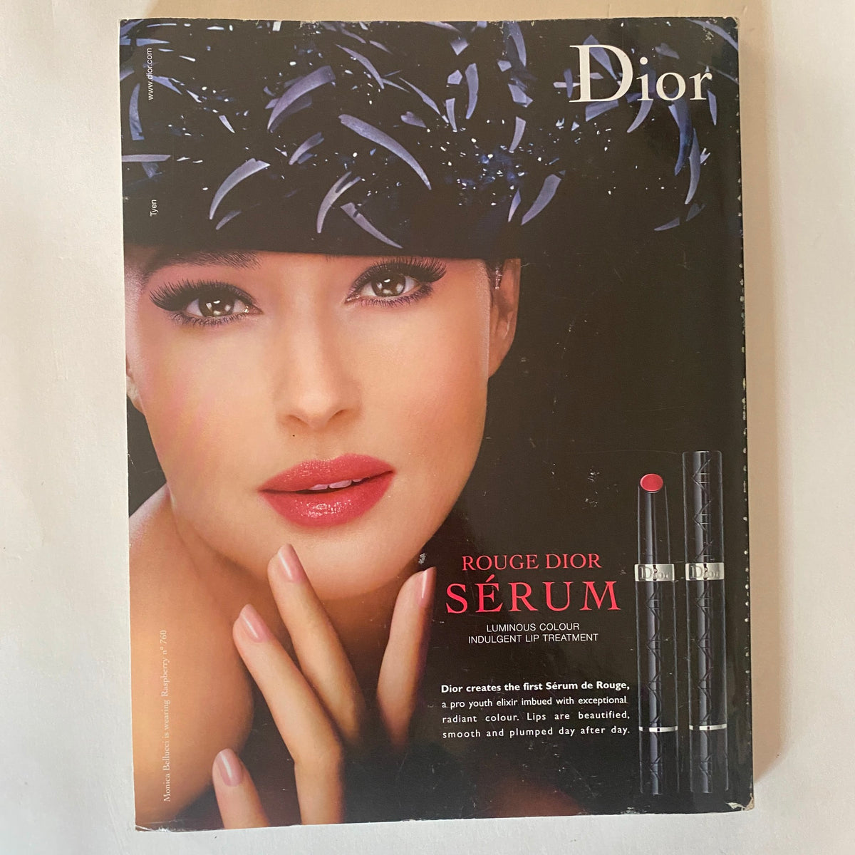Back cover of Vogue UK Magazine October 2009 featuring a Dior advertisement for Rouge Dior Serum, emphasizing luxury and beauty.