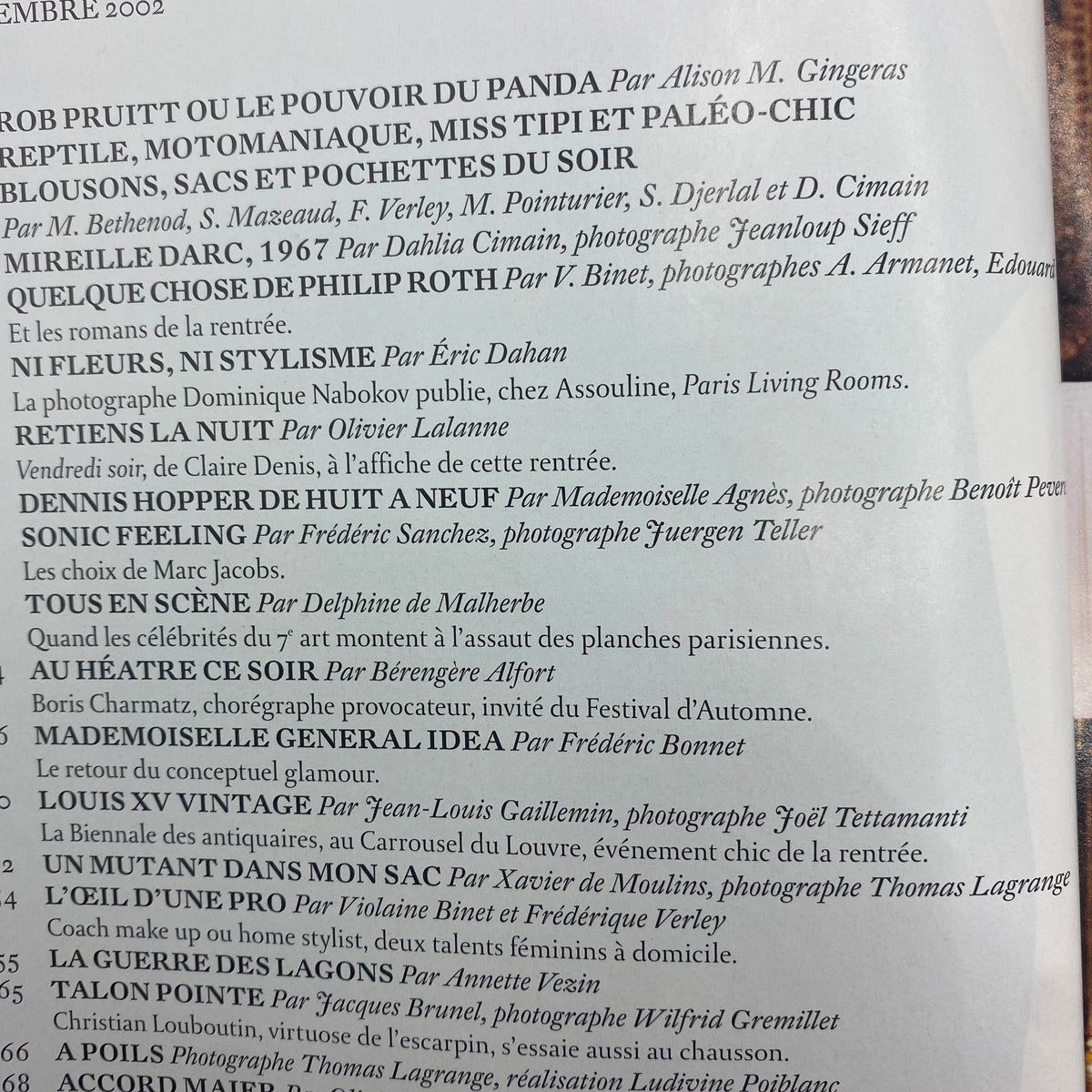 Table of contents from Vogue Paris Magazine September 2002, detailing feature articles and influential fashion stories with contributions from various authors.