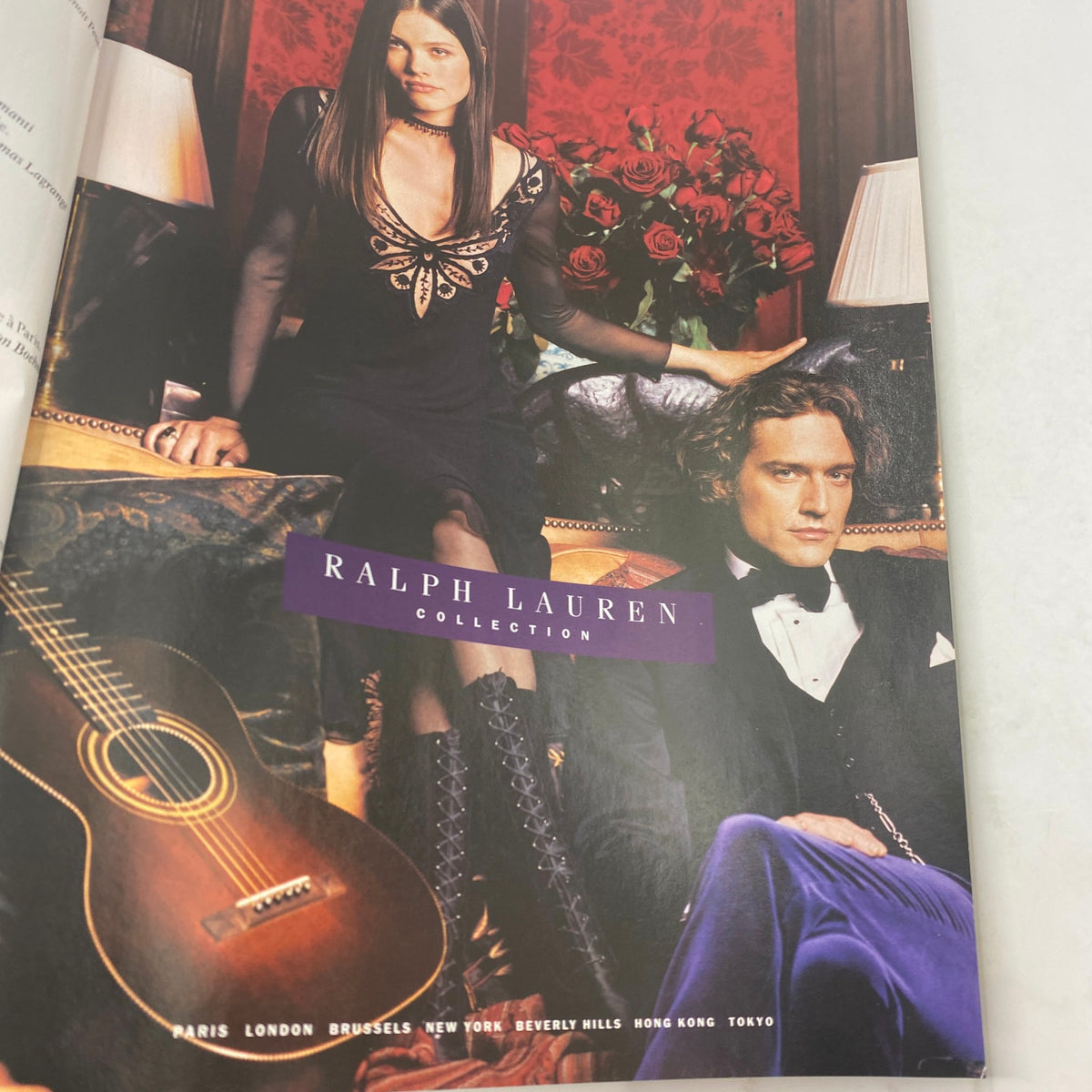 Ralph Lauren Collection advertisement from Vogue Paris Magazine September 2002, displaying sophisticated fashion styles and luxurious aesthetics.