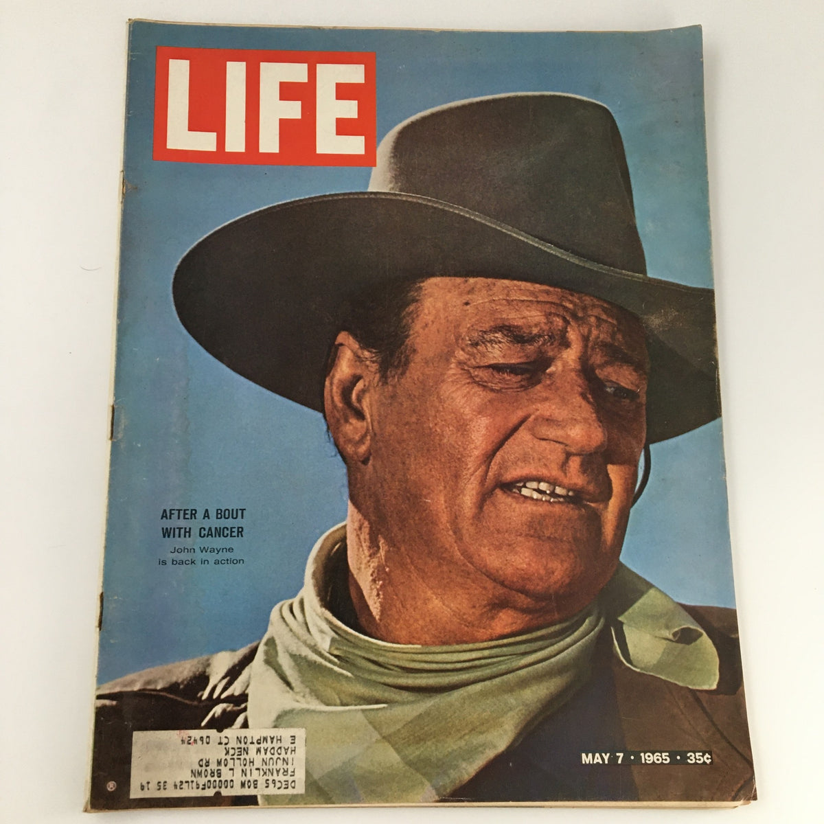 Life Magazine cover from May 7, 1965 featuring actor John Wayne, after his battle with cancer, highlighting his return to action.
