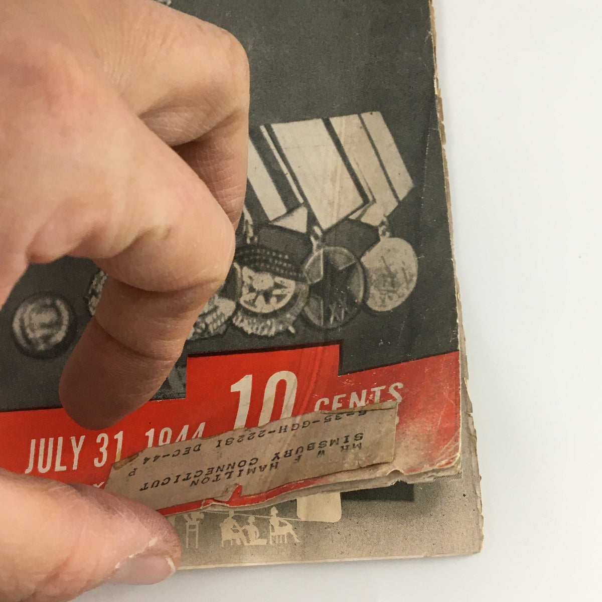 Back cover of VTG Life Magazine July 31 1944 showcasing a vintage advertisement for Coca-Cola, featuring military personnel interacting under an airplane.