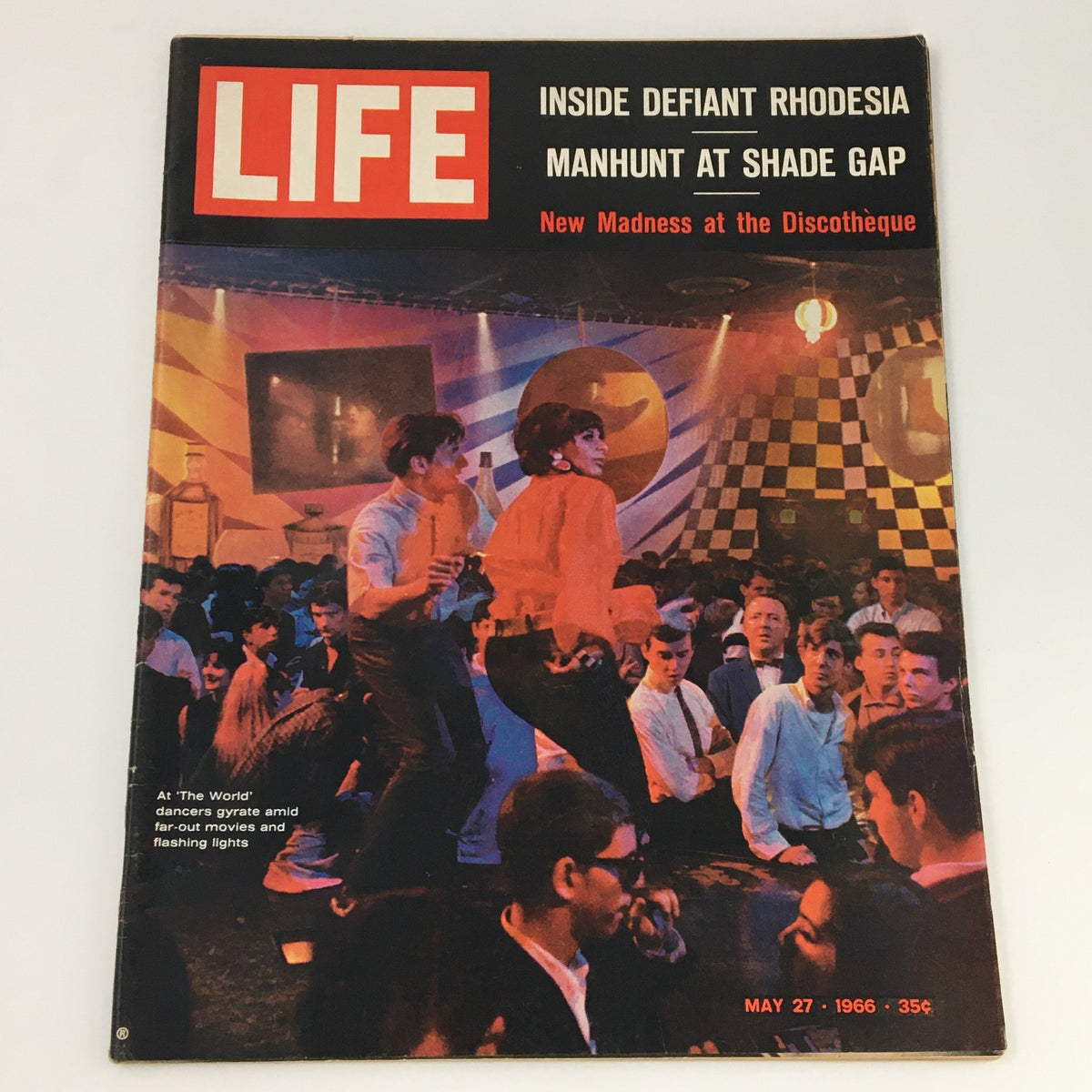 Cover of VTG Life Magazine dated May 27, 1966 featuring the article 'New Madness at the Discotheque'. The image captures a lively dance scene with people enjoying the nightlife in a vibrant discotheque setting.