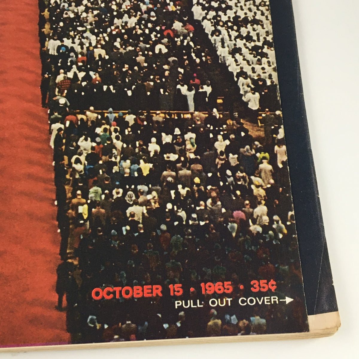 Close-up view of the October 15 1965 issue of VTG Life Magazine, emphasizing the date and price, while depicting Pope Paul VI's prominent public event in America with a large audience on the cover.
