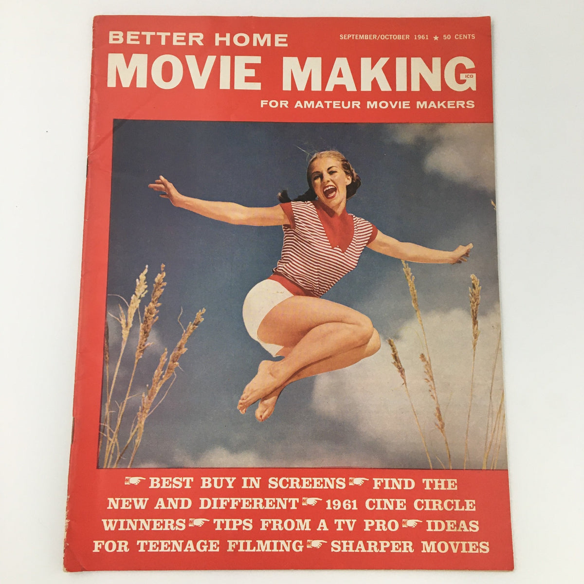 Cover of Better Home Movie Making Magazine September October 1961 featuring a woman joyfully leaping, showcasing tips for amateur filmmakers and cinematic techniques.
