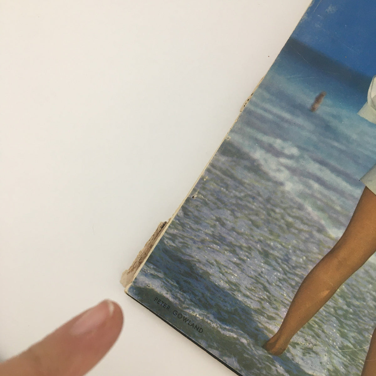 Close-up view of the Popular Photography Magazine August 1949 cover featuring a beach scene, emphasizing vintage photography aesthetics.