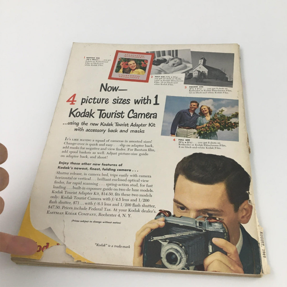 Back cover of the Popular Photography Magazine August 1949, showcasing Kodak Tourist Camera promotional content, embodying 1940s photography culture.
