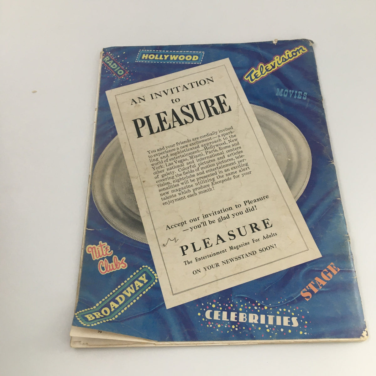 Back cover of VTG Escapade Magazine February 1957 with a colorful advertisement for 'Pleasure' magazine, reflecting mid-century design aesthetics.