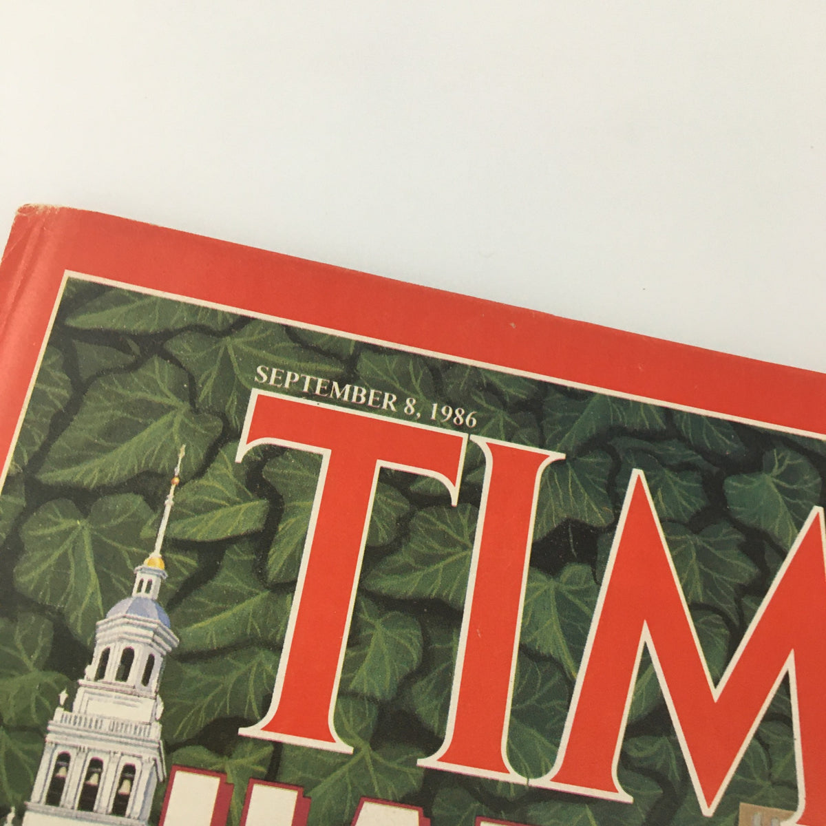 Close-up of the Time Magazine cover date, September 8, 1986, featuring a leafy background and the prominent title 'TIME HARVARD'.