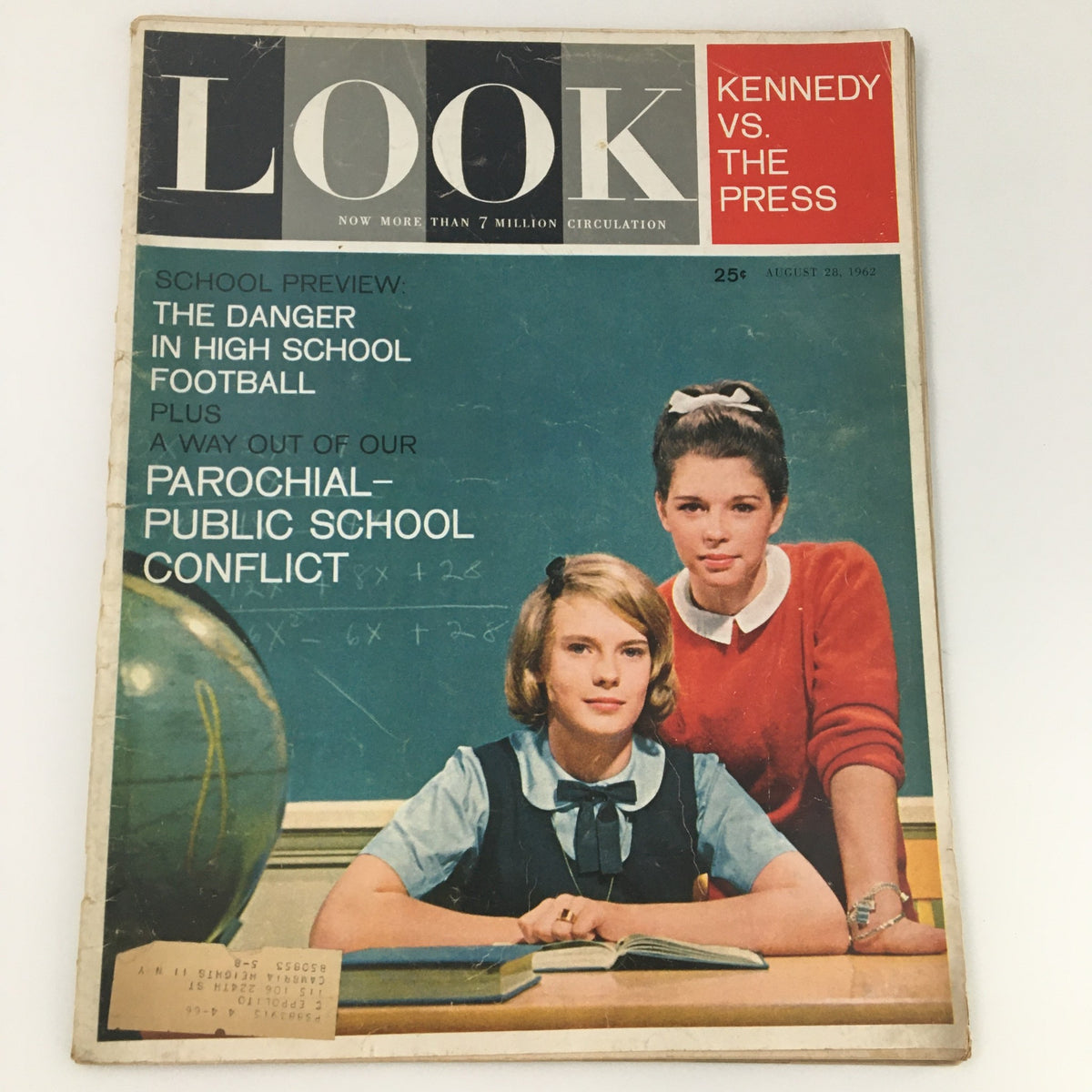 Cover of VTG Look Magazine August 28, 1962 featuring an article on John F. Kennedy, highlighting 'School Preview: The Danger in High School Football' and 'Parochial-Public School Conflict'. The image shows two young women posed with a backdrop of a classroom, with elements like an old globe and a chalkboard visible.