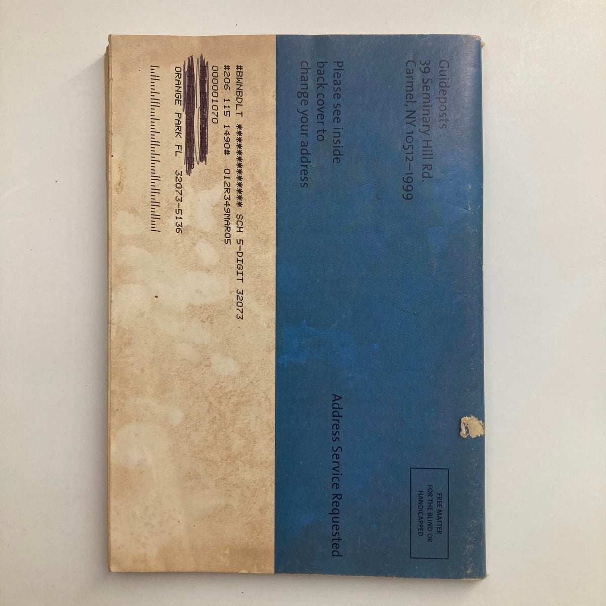 Back cover of Guideposts Magazine January 2004 showcasing subscription information and return address with vintage appeal.