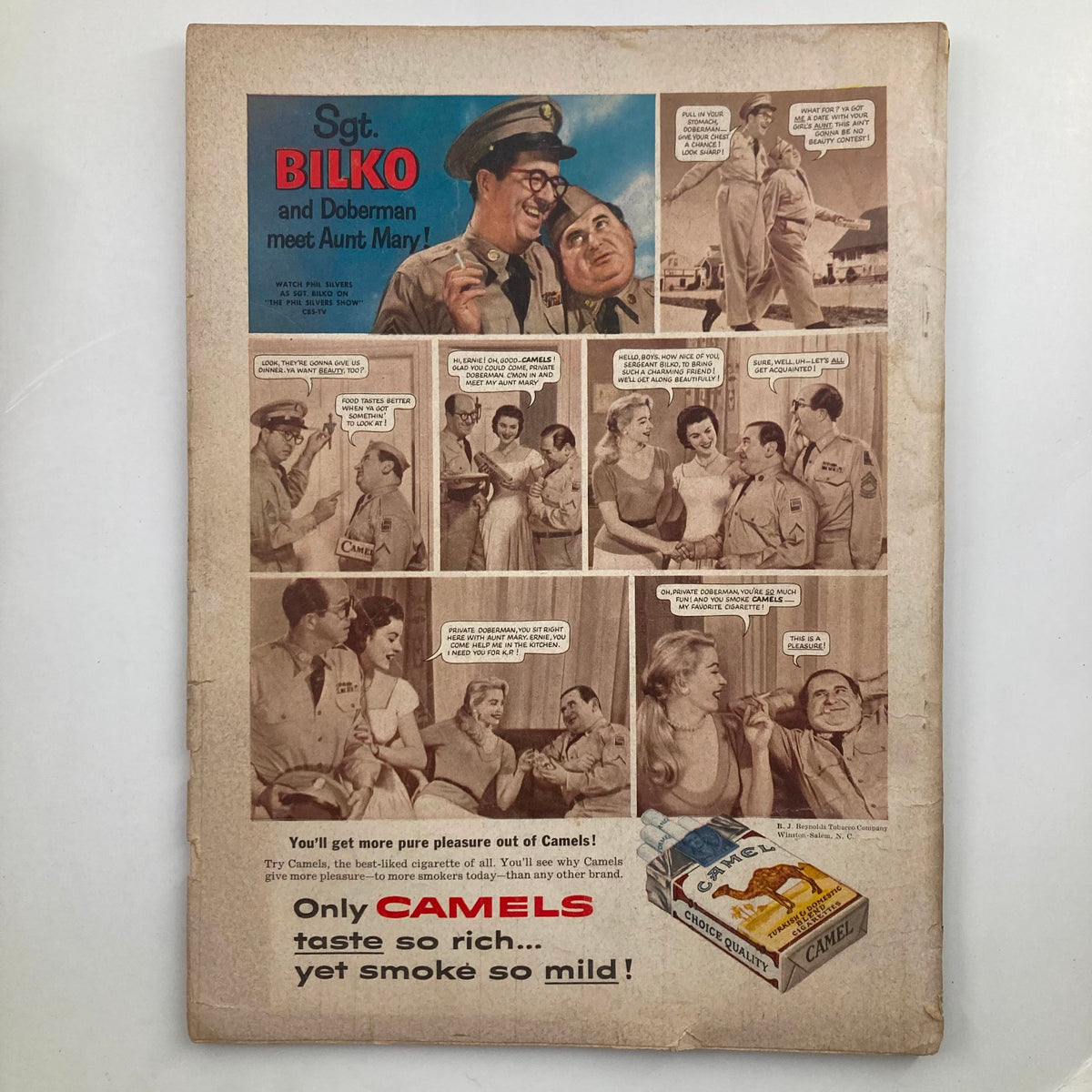 Back cover of VTG True The Man's Magazine October 1956 featuring a comic strip advertisement for Camels cigarettes, highlighting the entertainment of the era.