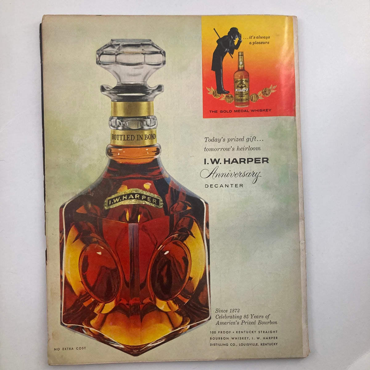 Advertisement for I.W. Harper Anniversary Decanter featured in VTG True The Man's Magazine December 1957 Riches in Toyland, emphasizing vintage whiskey packaging.
