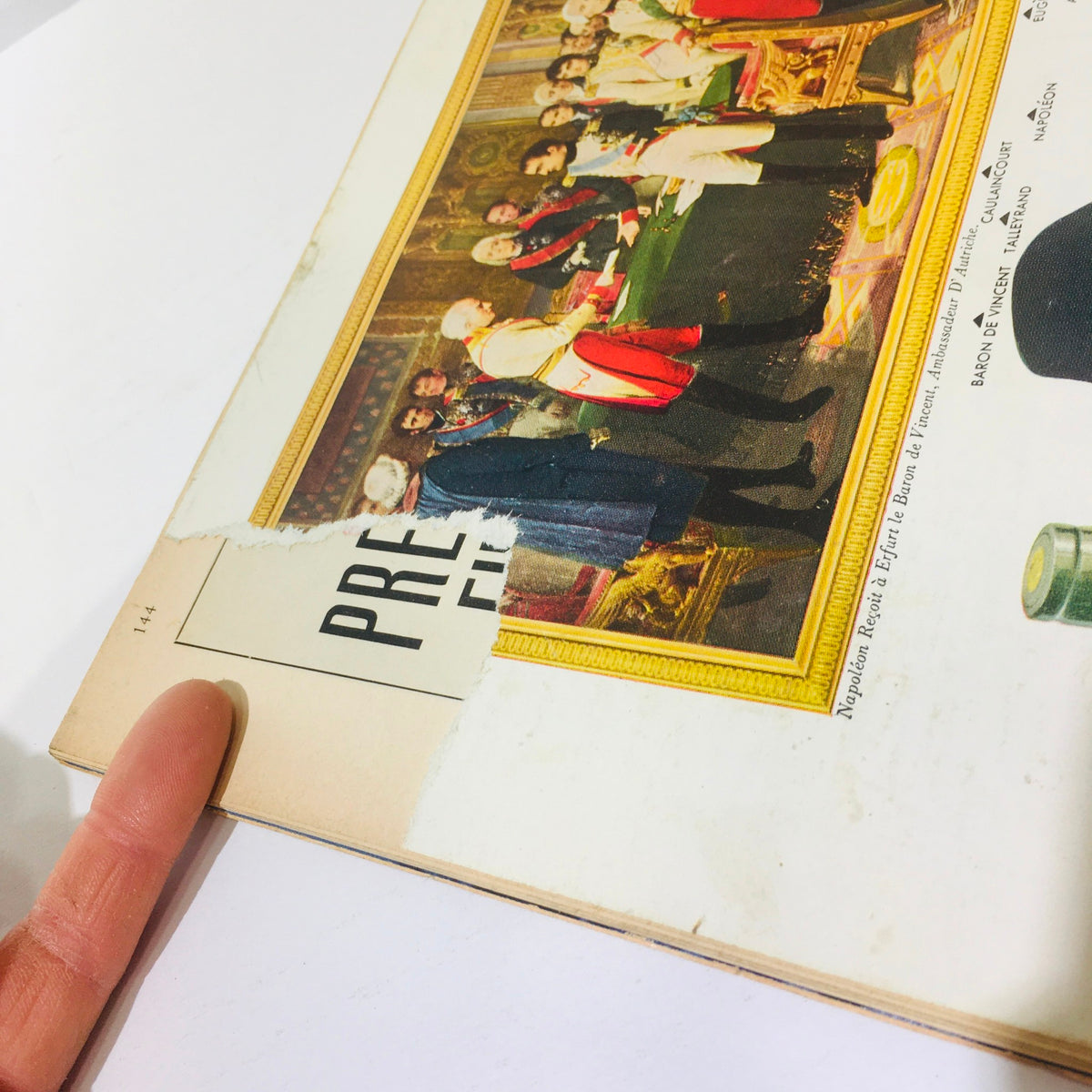 Close-up view of the back cover of The New Yorker Magazine June 7 1958, showing minor wear and a rip, highlighting its vintage condition.