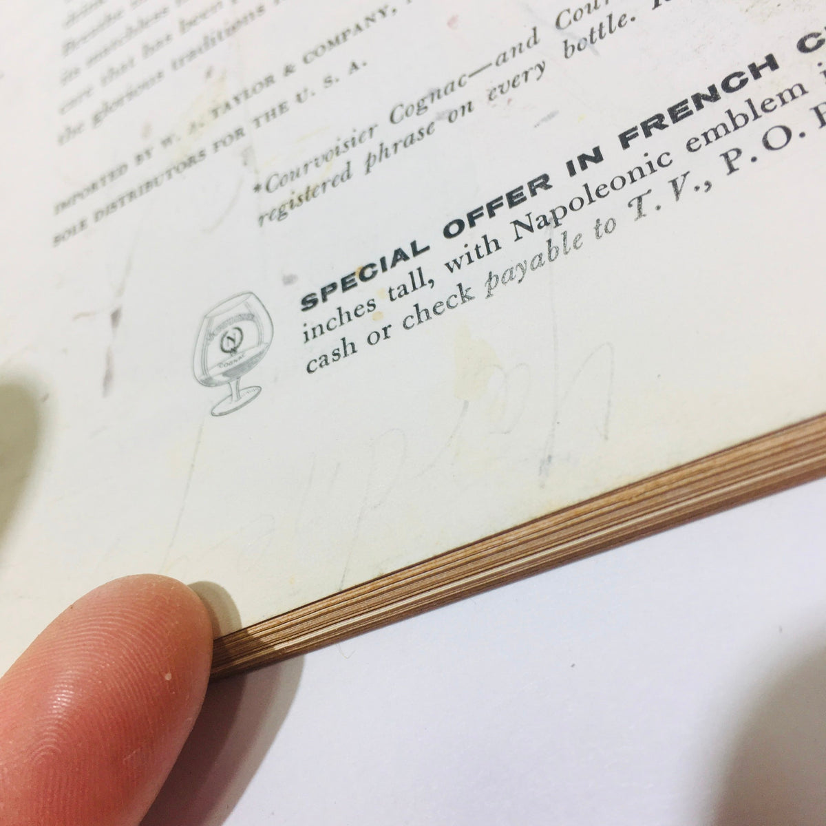 Close-up of an advertisement page from The New Yorker Magazine September 27 1958, showing a special offer in French with an illustration of a cognac glass. This page highlights the vintage appeal of the magazine featuring a design relevant to the era.