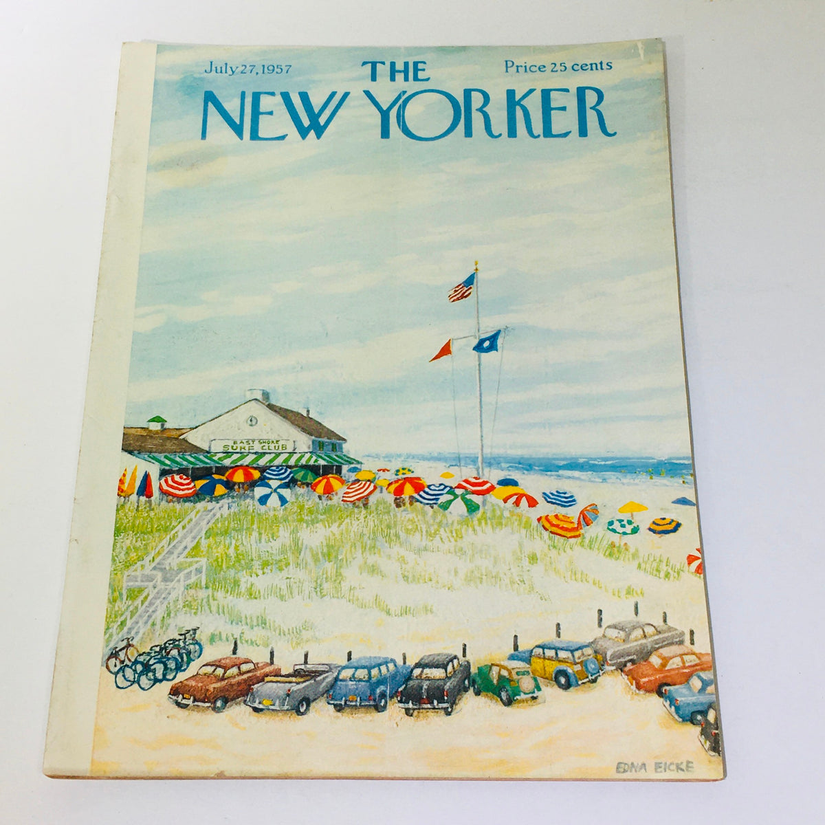 The New Yorker: July 27 1957 - Cover featuring a beach scene with colorful umbrellas and vintage cars, designed by Edna Eicke.