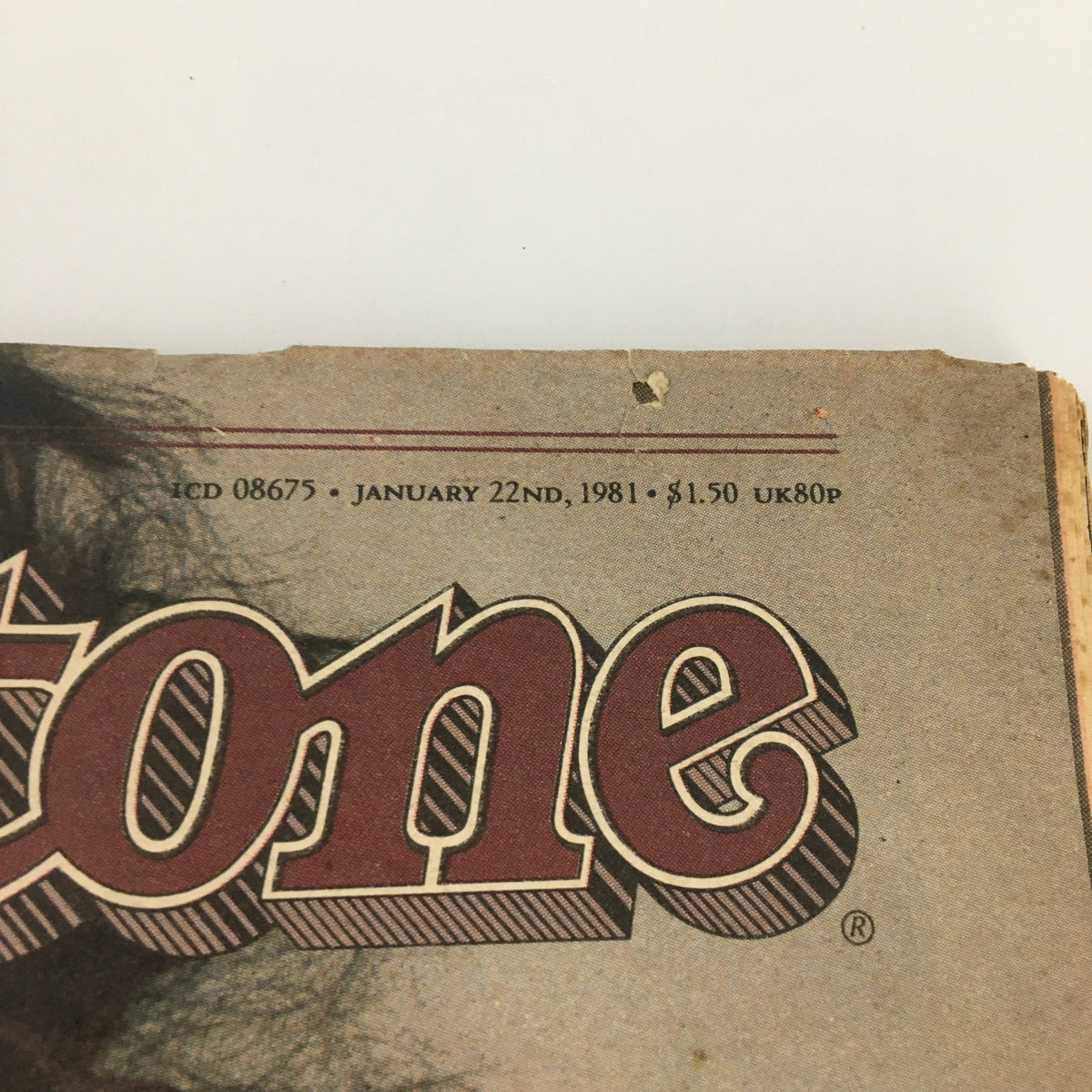 Close-up of the logo and publication date on the vintage Rolling Stone Magazine from January 22, 1981 featuring Yoko Ono and John Lennon.