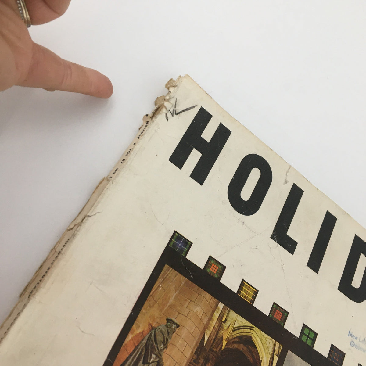 Close-up view of the top edge of the VTG Holiday Magazine May 1960, showing the title and minor wear, emphasizing the vintage quality of the Historic Scotland feature.