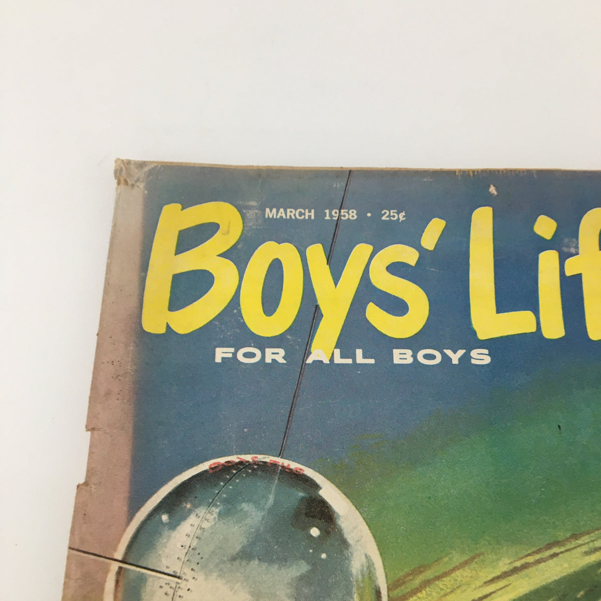 Close-up of the cover of VTG Boys' Life Magazine March 1958 displaying the title and details about Roy Campanella and the Moonwatch memo.