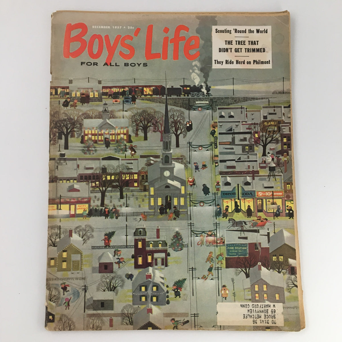 Cover of Boys' Life Magazine December 1957 featuring the article 'The Tree That Didn't Get Trimmed', showcasing a vibrant winter scene with families and children engaging in festive activities.