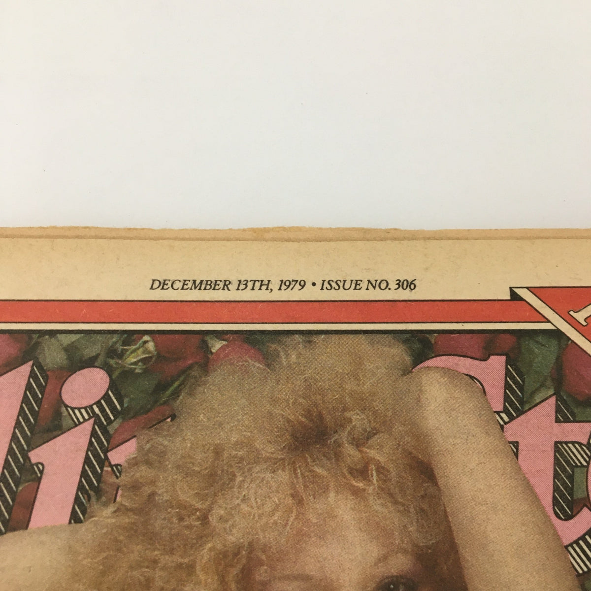Close-up of Vintage Rolling Stone Magazine December 13 1979 Issue #306 showing the date and issue number with Bette Midler cover.