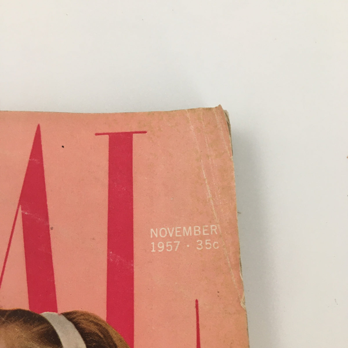 Close-up of the VTG Ladies' Home Journal Magazine November 1957 showing the date and price, highlighting its vintage charm.