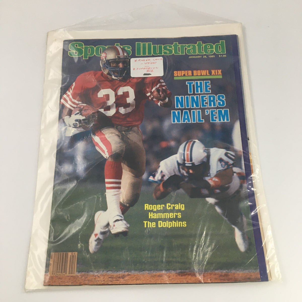 Sports Illustrated Magazine January 28, 1985 in protective bag featuring Roger Craig on the front cover with the headline 'The Niners Nail 'Em'.
