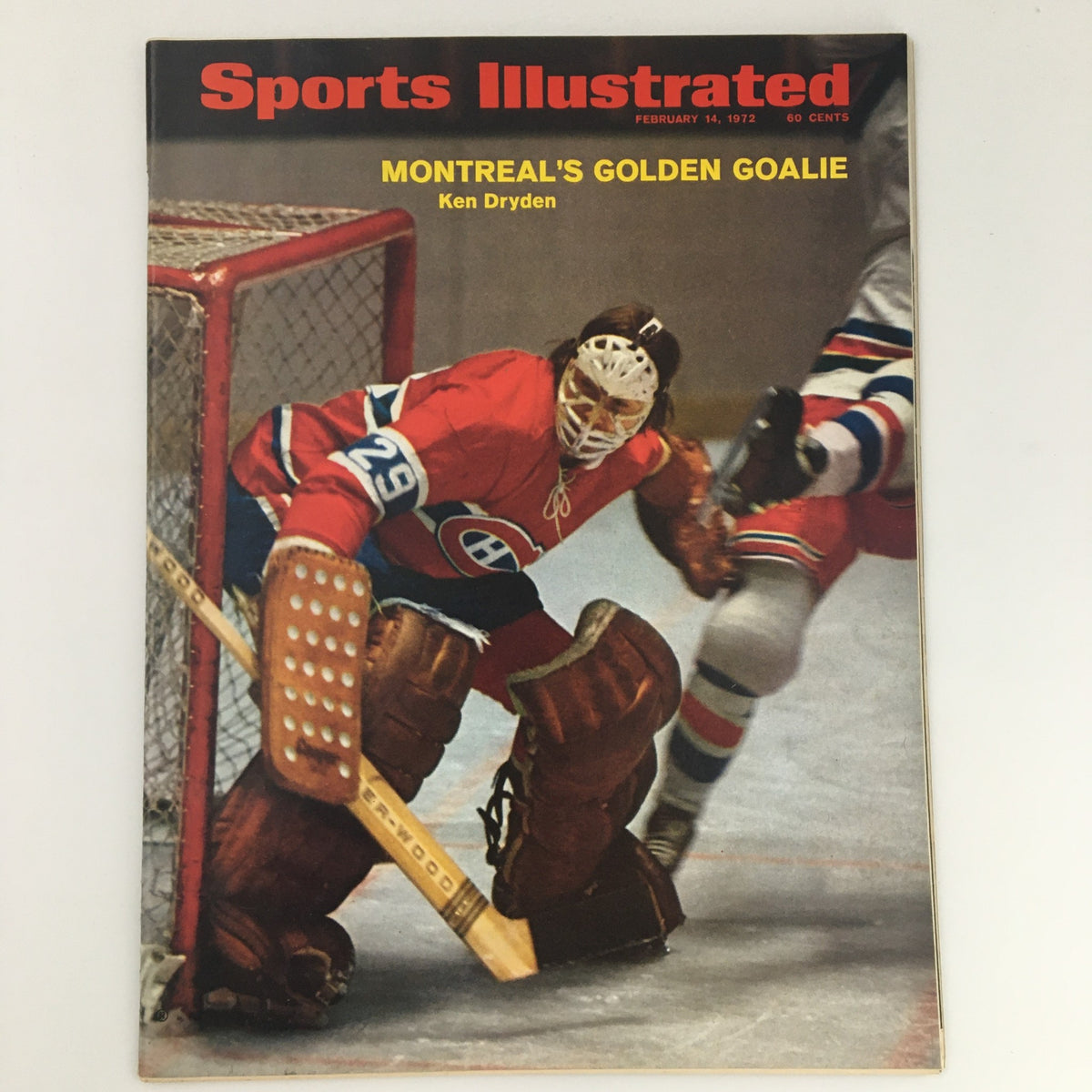 Sports Illustrated magazine cover from February 14, 1972, featuring Ken Dryden, the Montreal Canadiens' goalkeeper, showcasing an iconic snapshot from hockey history.