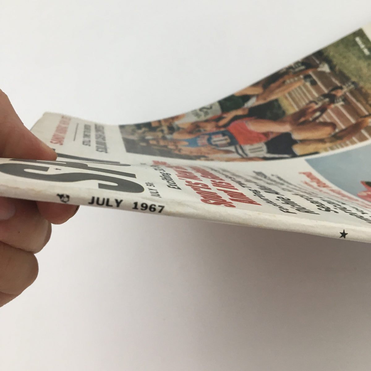 Side view of the VTG Sport Magazine from July 1967, showcasing the magazine spine with month and year clearly labeled.