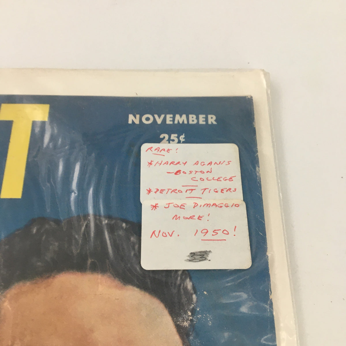 Detailed view of the VTG Sport Magazine November 1950, showcasing a rare sticker noting Harry Aganis and other notable topics, emphasizing its collectible status.