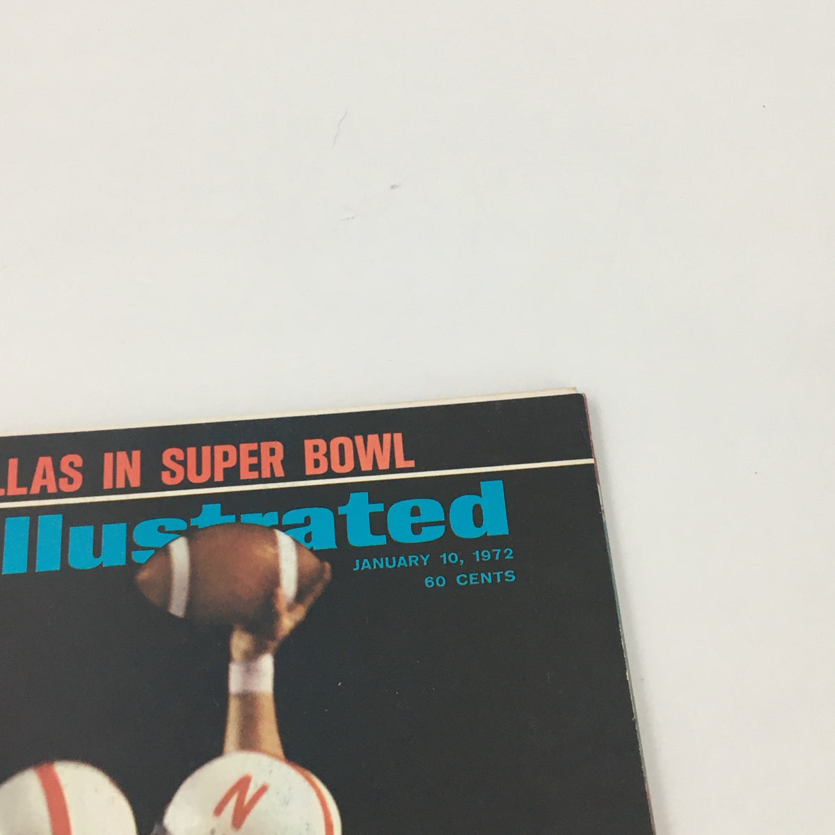 Close-up of the January 10, 1972 Sports Illustrated Magazine cover showcasing Nebraska's Janssen catching a football.