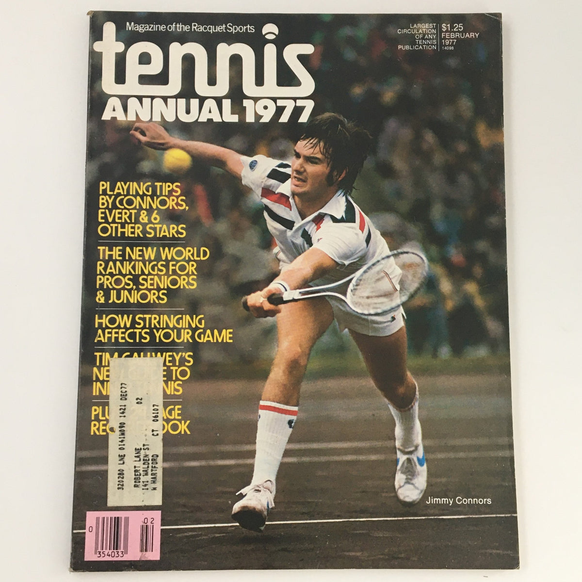 Vintage Tennis Magazine February 1977 featuring tennis player Jimmy Connors on the cover, showcasing his dynamic action pose during a match.
