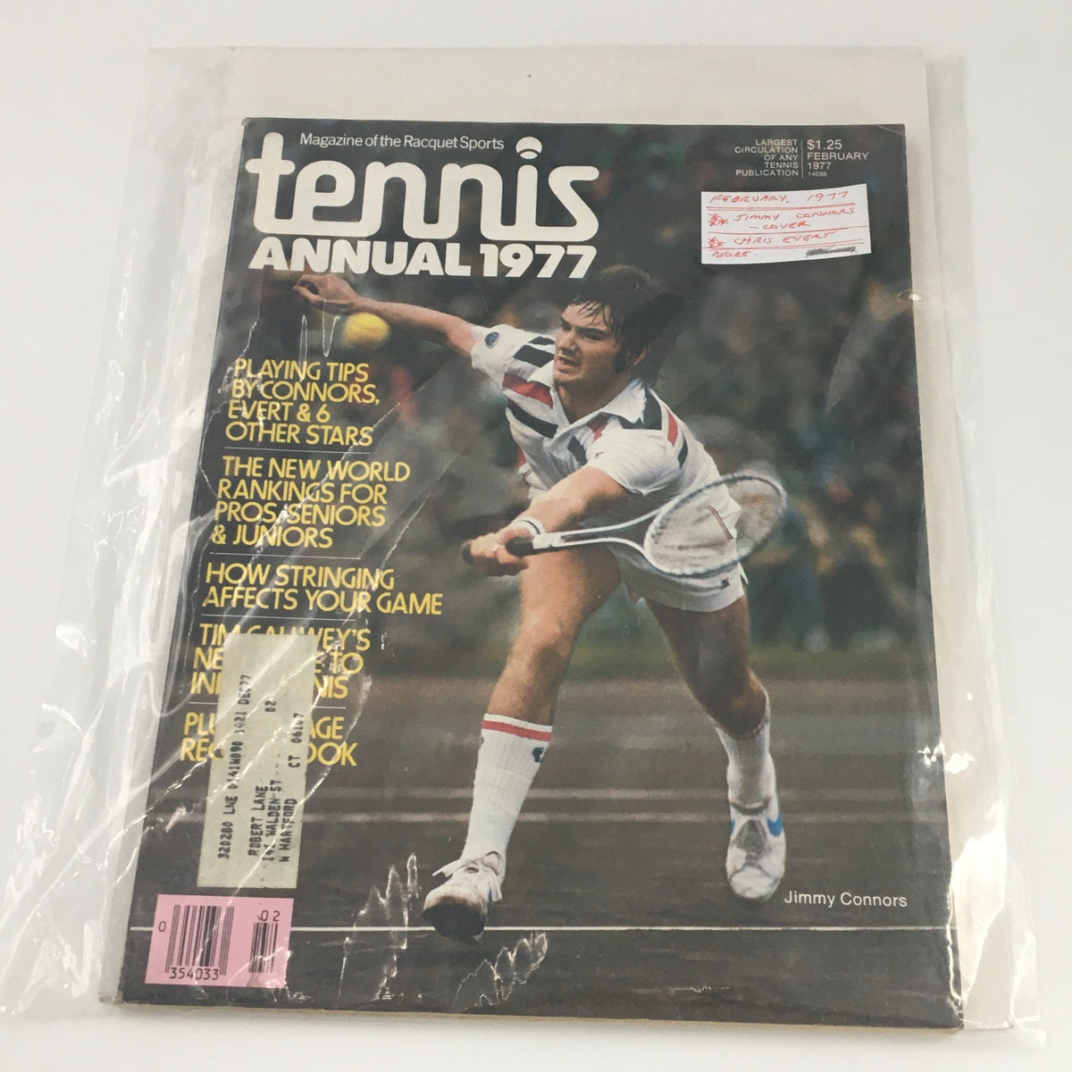 February 1977 Tennis Magazine with Jimmy Connors on the front cover, displayed in a protective bag, reflecting its collectible status.