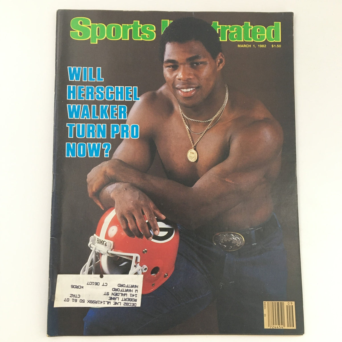 Vintage Sports Illustrated magazine featuring Herschel Walker on the cover, dated March 1, 1982. The magazine showcases Herschel Walker, a prominent college football player, posing with a football helmet and wearing a necklace, emphasizing his athleticism and charm.