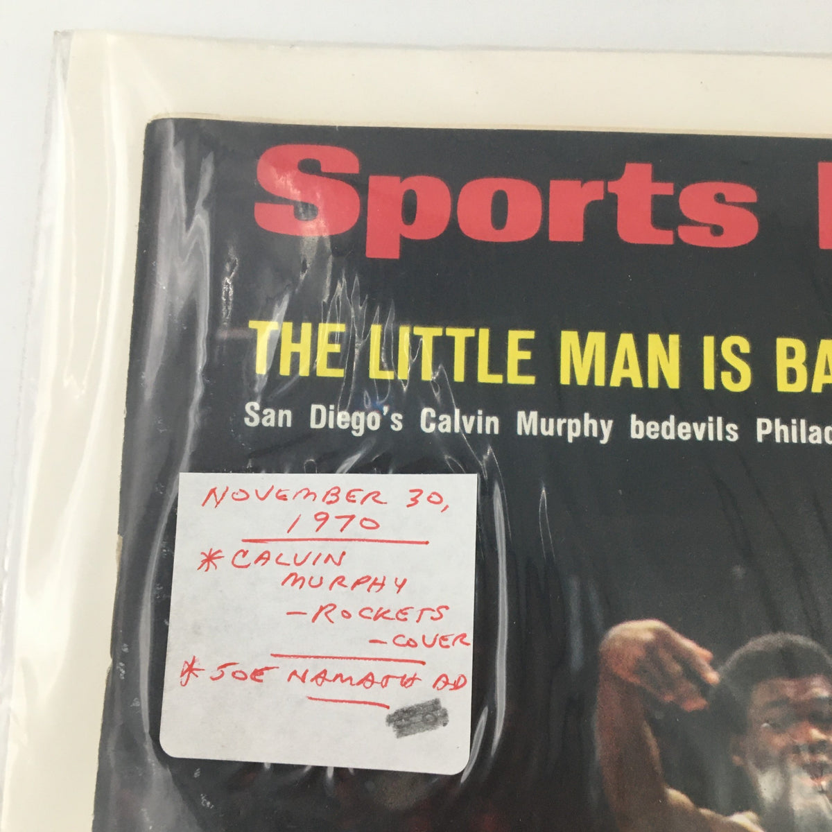 Close-up of the Sports Illustrated Magazine dated November 16, 1970, highlighting Calvin Murphy on the cover, with text detailing the magazine's content and significance in sports history.