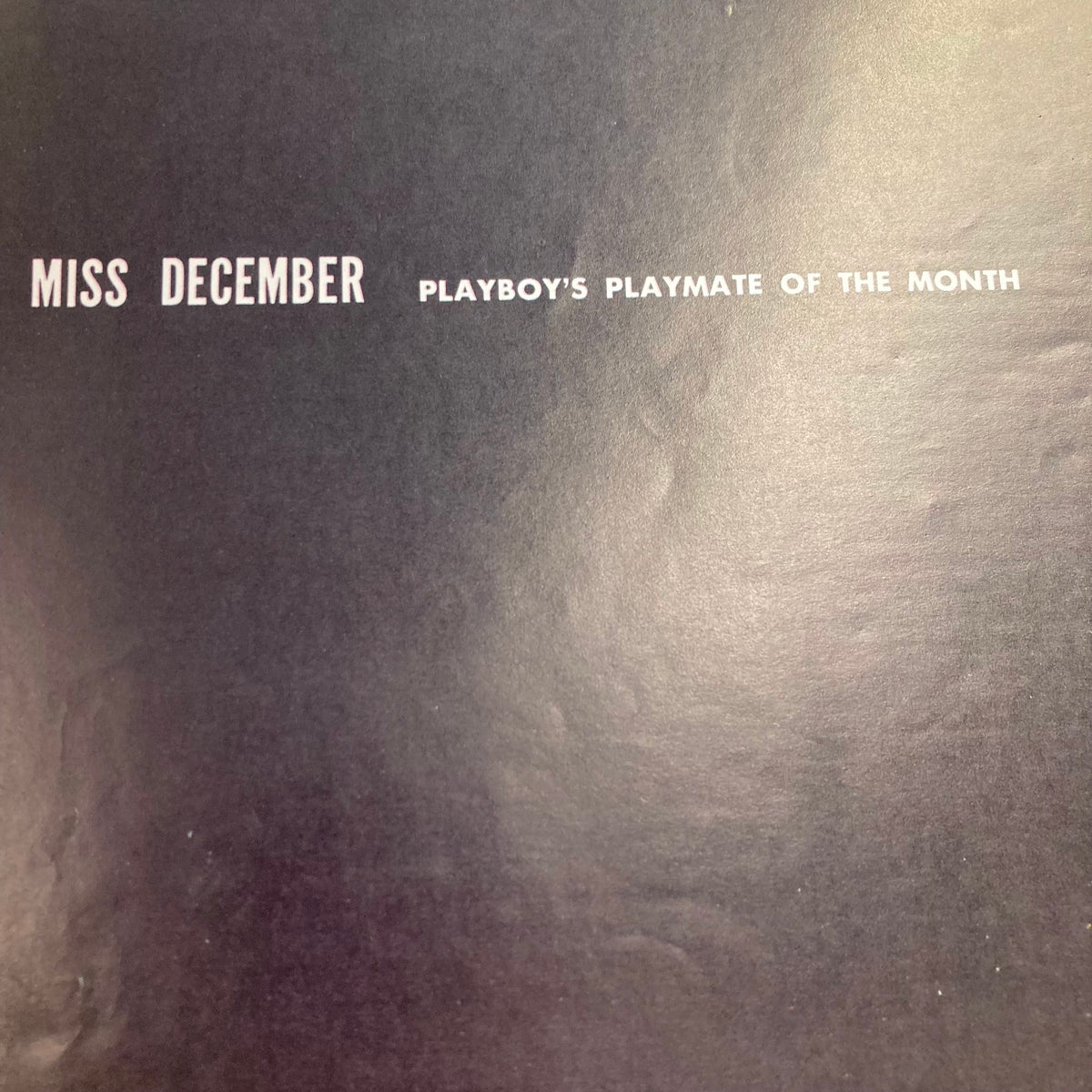 Page from VTG Playboy Magazine December 1957 titled 'Miss December', highlighting Playboy's Playmate of the Month.
