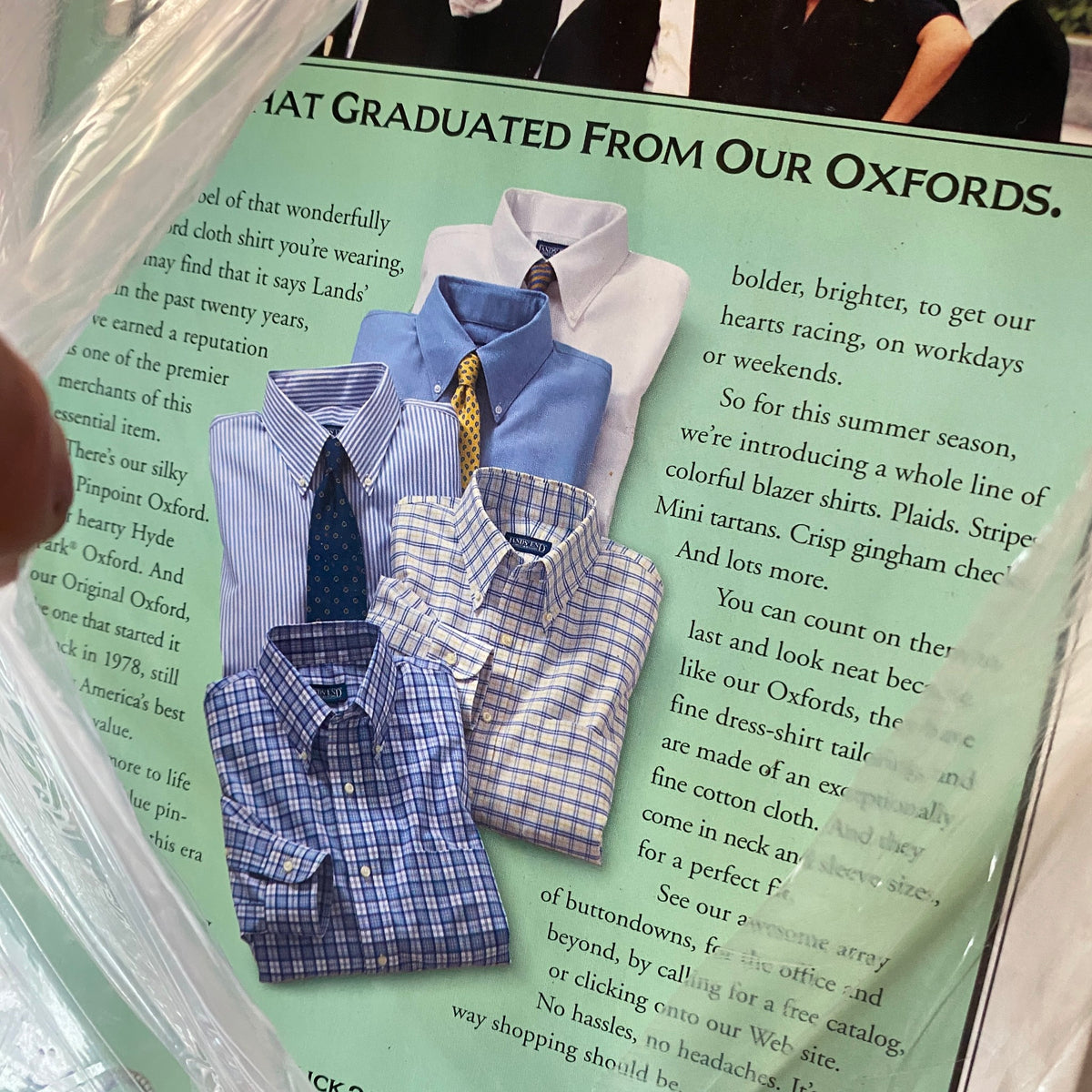 A vibrant collection of plaid and checkered dress shirts displayed on the back cover of the 2001 Oxford American 5th Annual Southern Music Issue, emphasizing stylish options for formal occasions and everyday wear.
