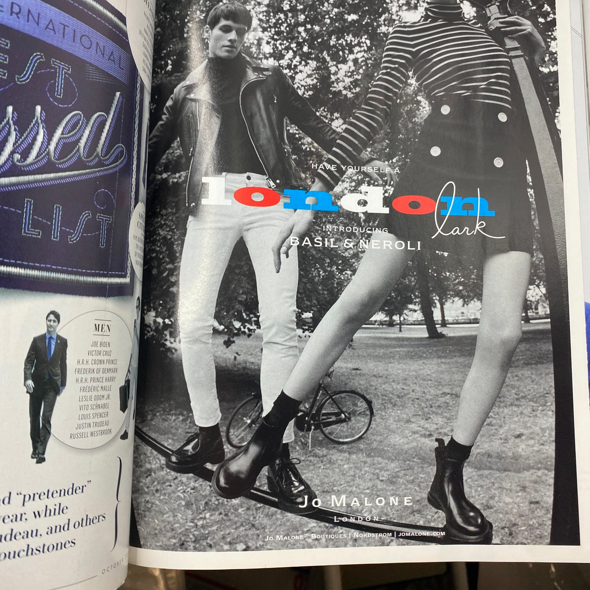 An advertisement page from Vanity Fair October 2016 showcasing Jo Malone's London fragrance, featuring stylish models and fashionable attire.