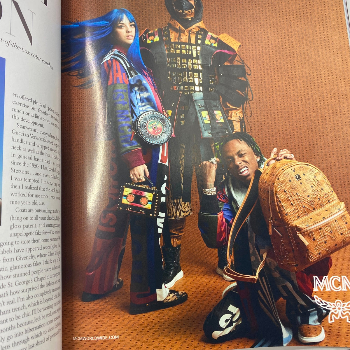 Fashion spread from Harper's Bazaar September 2018 showcasing vibrant streetwear styles, featuring a model with blue hair and a fashionable outfit.