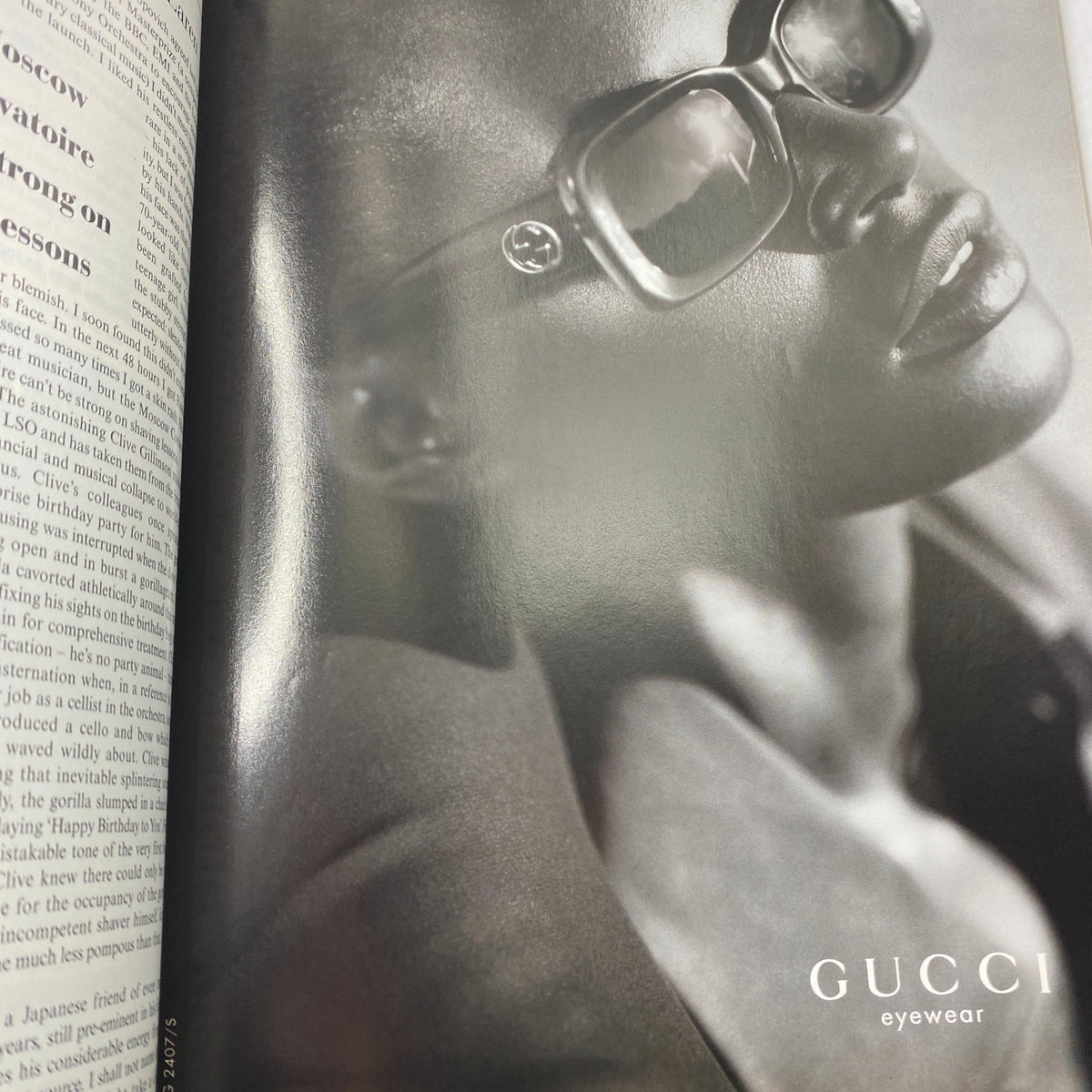 Tatler Magazine Jade Jagger Cover featuring a black and white advertisement for GUCCI eyewear, showcasing a model wearing stylish sunglasses.